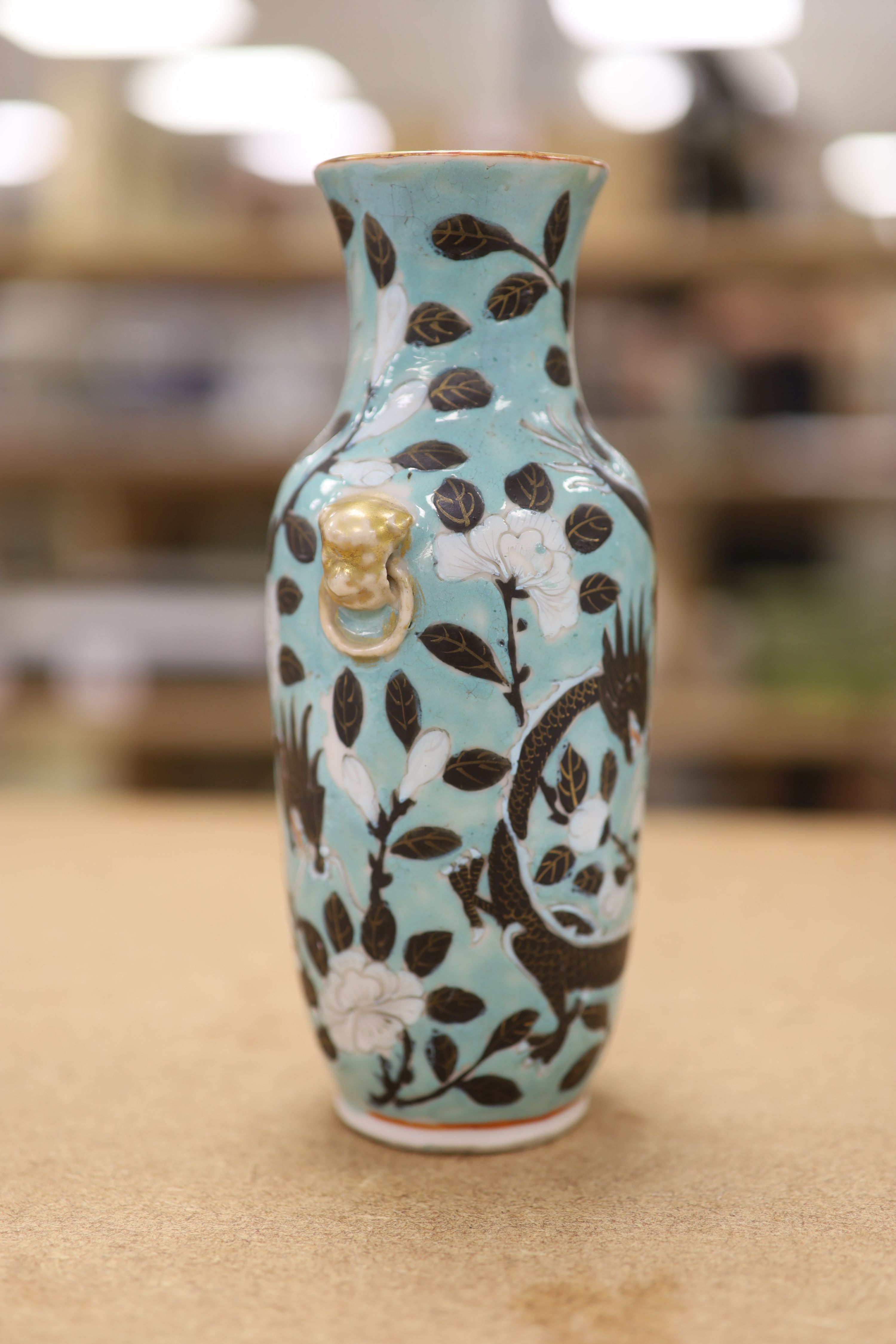 A Chinese turquoise glazed 'dragon' vase, c.1900, height 18cm
